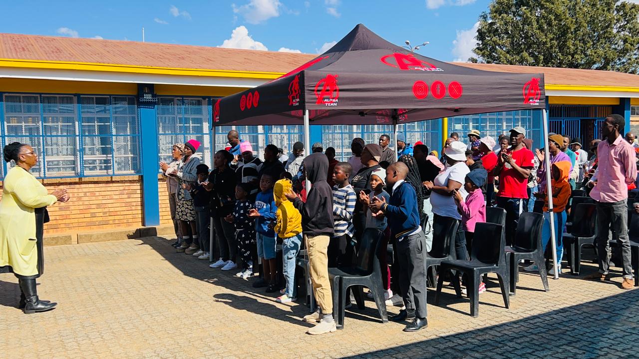 Learners and parents at the hand-over